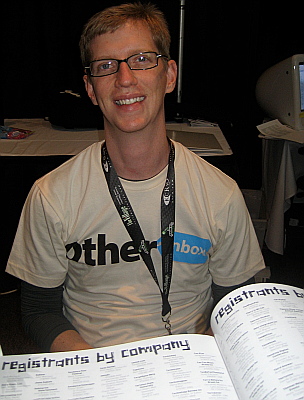 The ever helpful Josh Dilworth of Porter Novelli working the press info stand.