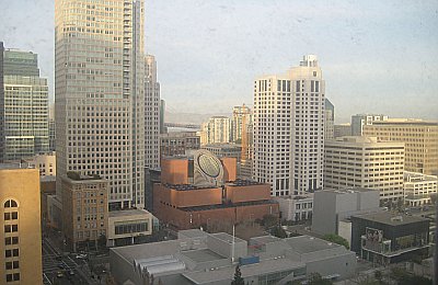 SF MoMA and the Bay Bridge thru my dirty hotel window.